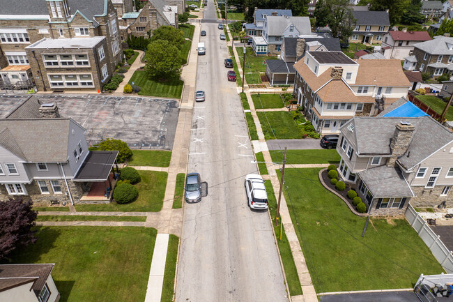 The neighborhood surrounding St. Andrew School is made up of large, single-family homes.