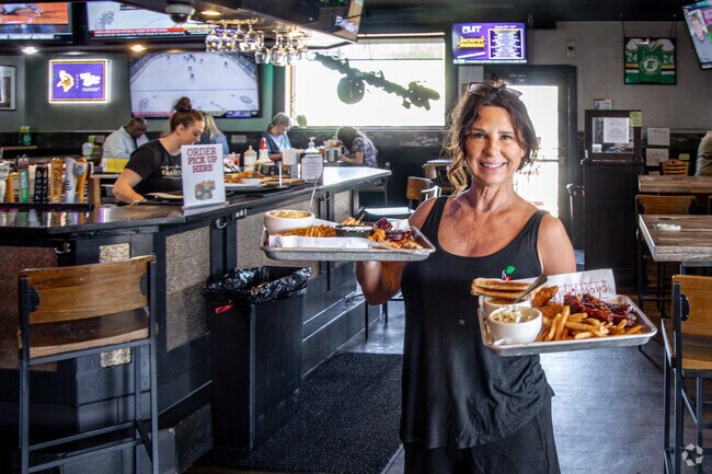 The Cherry Pit Bar & Grill is a local favorite sports bar near Beaver Lake Heights.