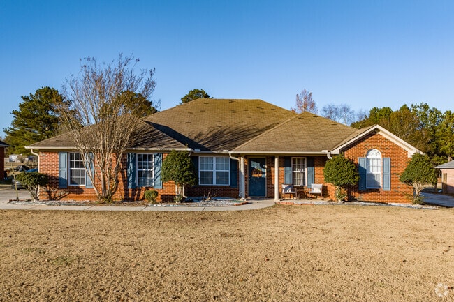 A beautiful read brick ranch-style home on a large lot in Ready Crossing.