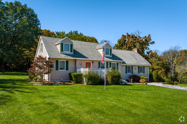 National pride is on display at this glorious split-level style home in Fredon Township, NJ.