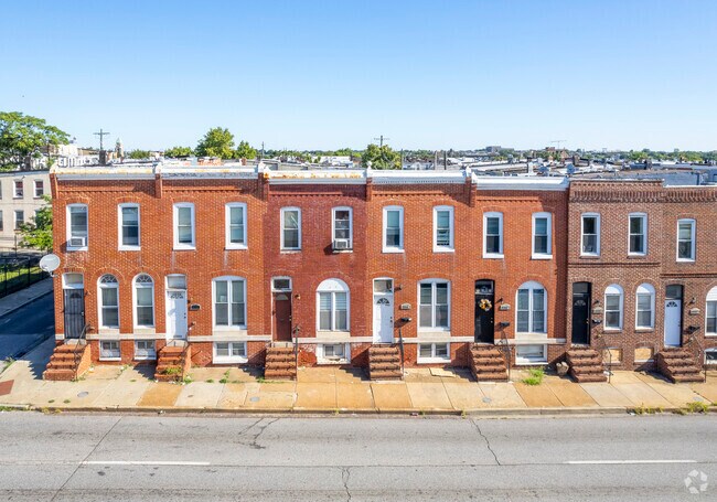 Most rowhomes in McElderry Park have red-brick facades.