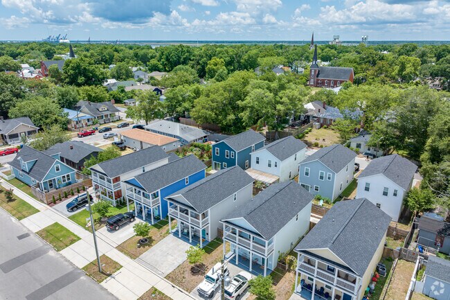 Newer 2-story homes in The Bottom feature Charleston-style porches.
