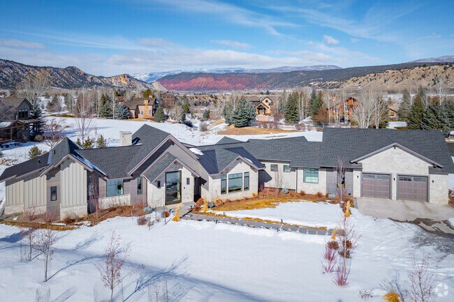 Aspen Glen townhomes feature modern designs and spacious layouts, providing comfort and luxury. Enjoy low-maintenance living with access to community amenities and stunning landscapes year-round.