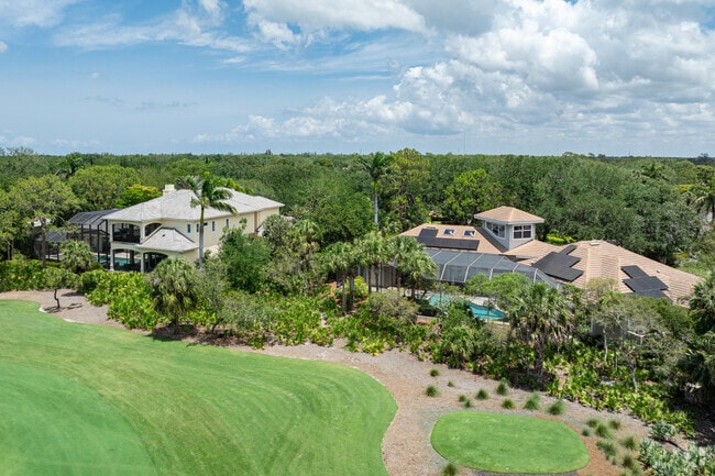 Palm River Estates features many large homes overlooking the greens of La Playa Golf Club.