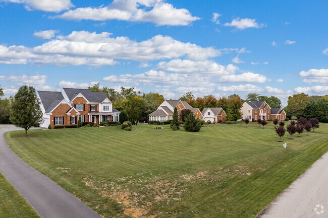 An impressive row of modern traditional homes in a planned subdivision in Beaver Creek.