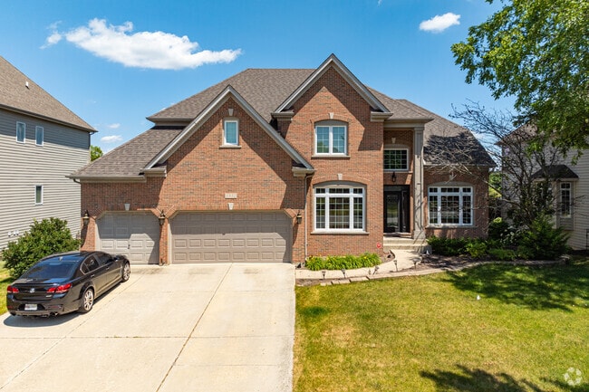 The magnificent homes of Tall Grass have ample garage space.