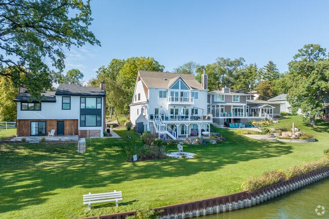 A row of beautiful homes line the banks of Diamond Lake in West Shore Park.