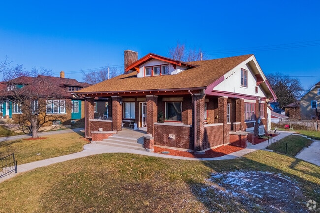 Brick bungalows with Craftsman touches appear around Burnham Park.