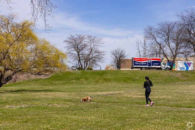A paved riverwalk at Wickes Park follows 4.4 miles of the Saginaw River.