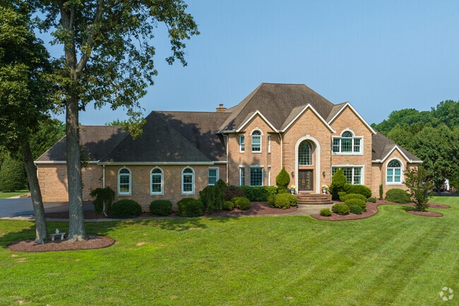 Beautiful brick Colonial tucked away on a quiet street in Kingsville.