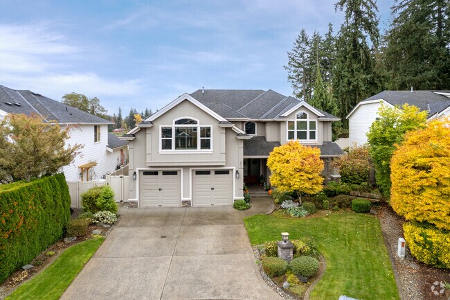 Stunning split-level home with perfect front yard in the Milton Neighborhood.