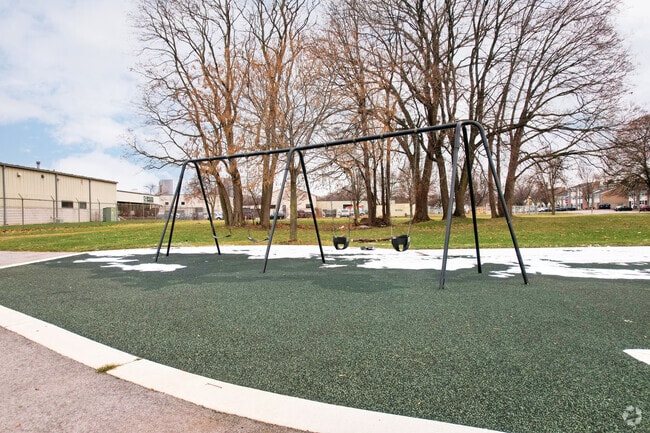 Troup Street Park features swings for young visitors.