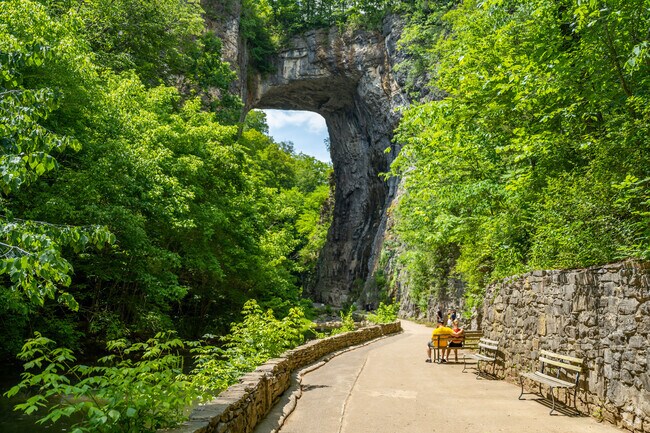 Natural Bridge State Park in Natural Bridge includes the iconic limestone arch, along with walking trails and seating areas for visitors.