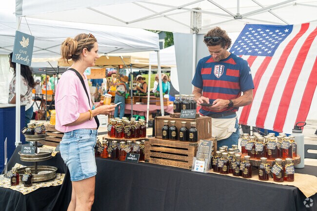 Vendors at the Artisan Collective Market in Batavia offer a variety of handmade goods.