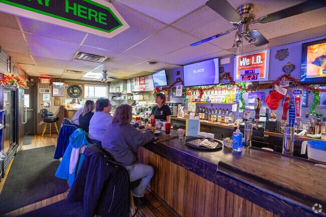 Locals enjoying a beer and a burger at the Ohio Inn Family Restaurant in North End.