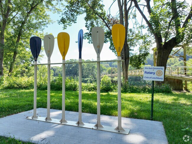 After crossing the Hyde Park Walking Bridge, you can rack up your bike and enjoy the park.