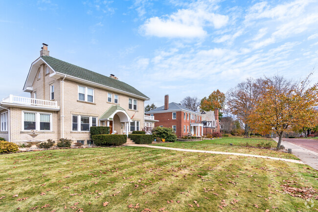 Sprawling front yards are the norm in the Vassar Park neighborhood.