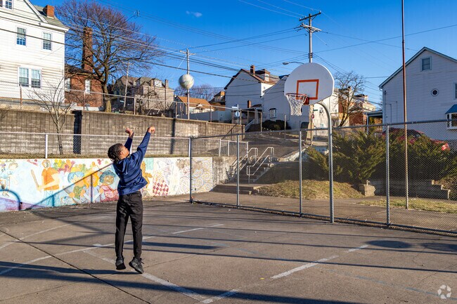 Shoot some hoops at Ormsby Avenue Park & Playground.