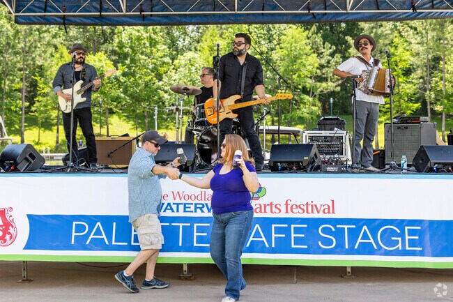 Various bands play each day of The Woodlands Waterway Arts Festival near Town Center.