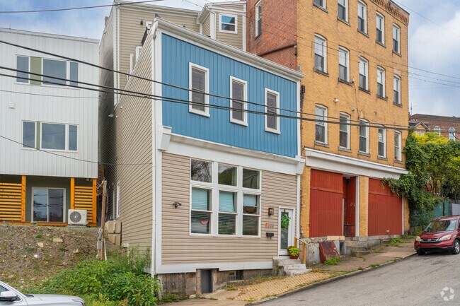 Updated row homes with unique color layouts are tending in Polish Hill.