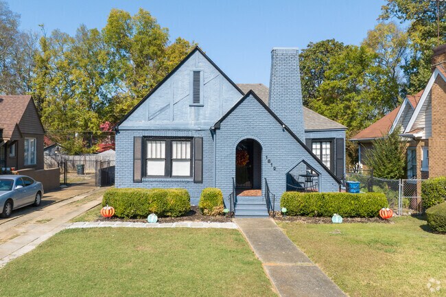 Germania Park has national-style homes with steep porch roofs.
