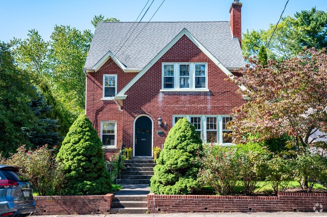 Brick Tudor Revival homes are frequent in East Rockhill neighborhoods.