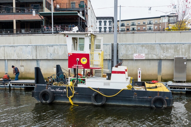 Boats traverse The Hudson River near The Hill.