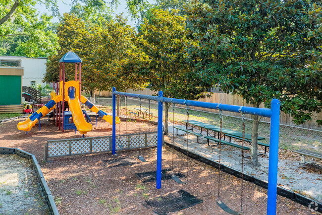 Students swing and slide at St. Patrick Interparish School.