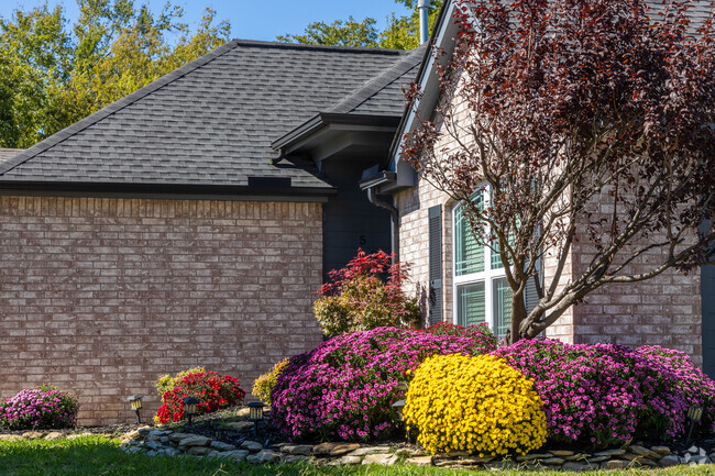 Vibrant landscaping and lush green lawns demonstrate the pride and care of neighbors in Dunbar.