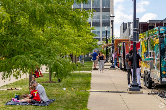 Rows of food trucks line the walkways at Food Truck Tuesdays in Jackson, Michigan.