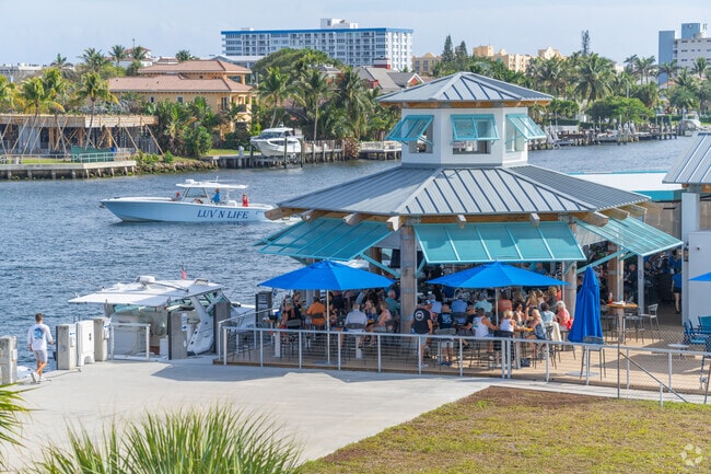 Experience The Cove Waterfront: Coastal vibes in Hillsboro Ranches.