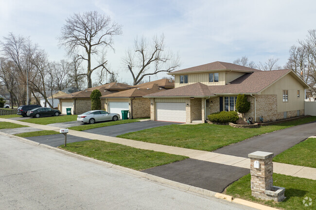 Rows of charming homes on residential Streets of the quaint area of Phoenix, IL.