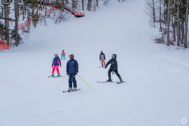 Families and friends in French Creek enjoy skiing the trails at Peek'n Peak Resort in winter.