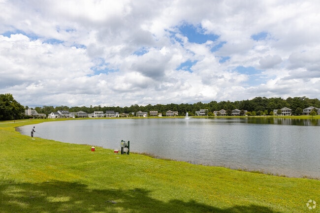 Locals enjoy a quiet morning by the lake in Berwick’s gated community.