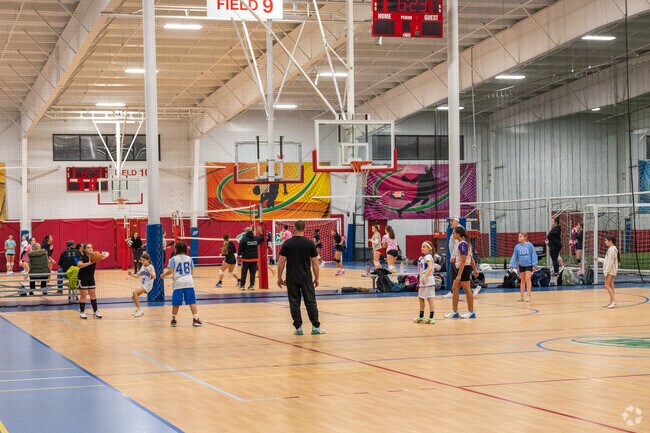 Whittenton Junction b-ball players work on ball movement at the Fore Kicks Sports Complex.