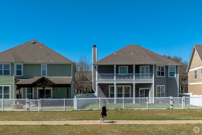 Running paths along Lake Providence Village are scenic next to colorful homes and the lake.