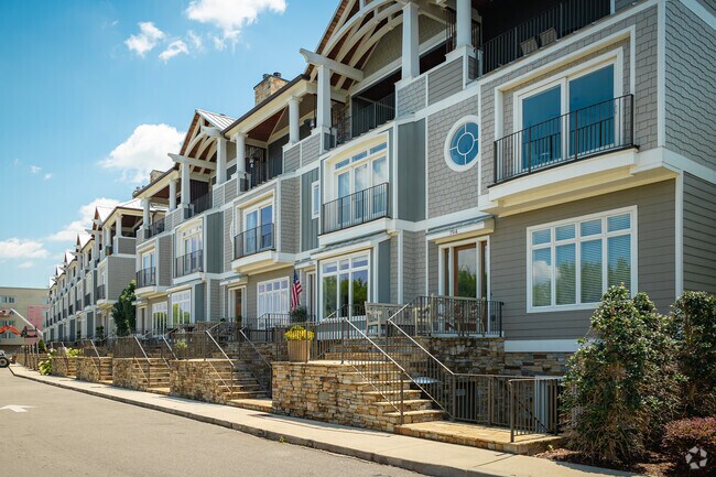 Luxury condos sit along the river and have rooftop views of Westside.