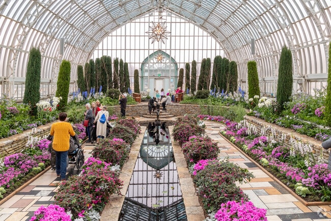 Visitors enjoy coming to see the seasonal garden exhibit at the Marjorie McNeely Sunken Garden.