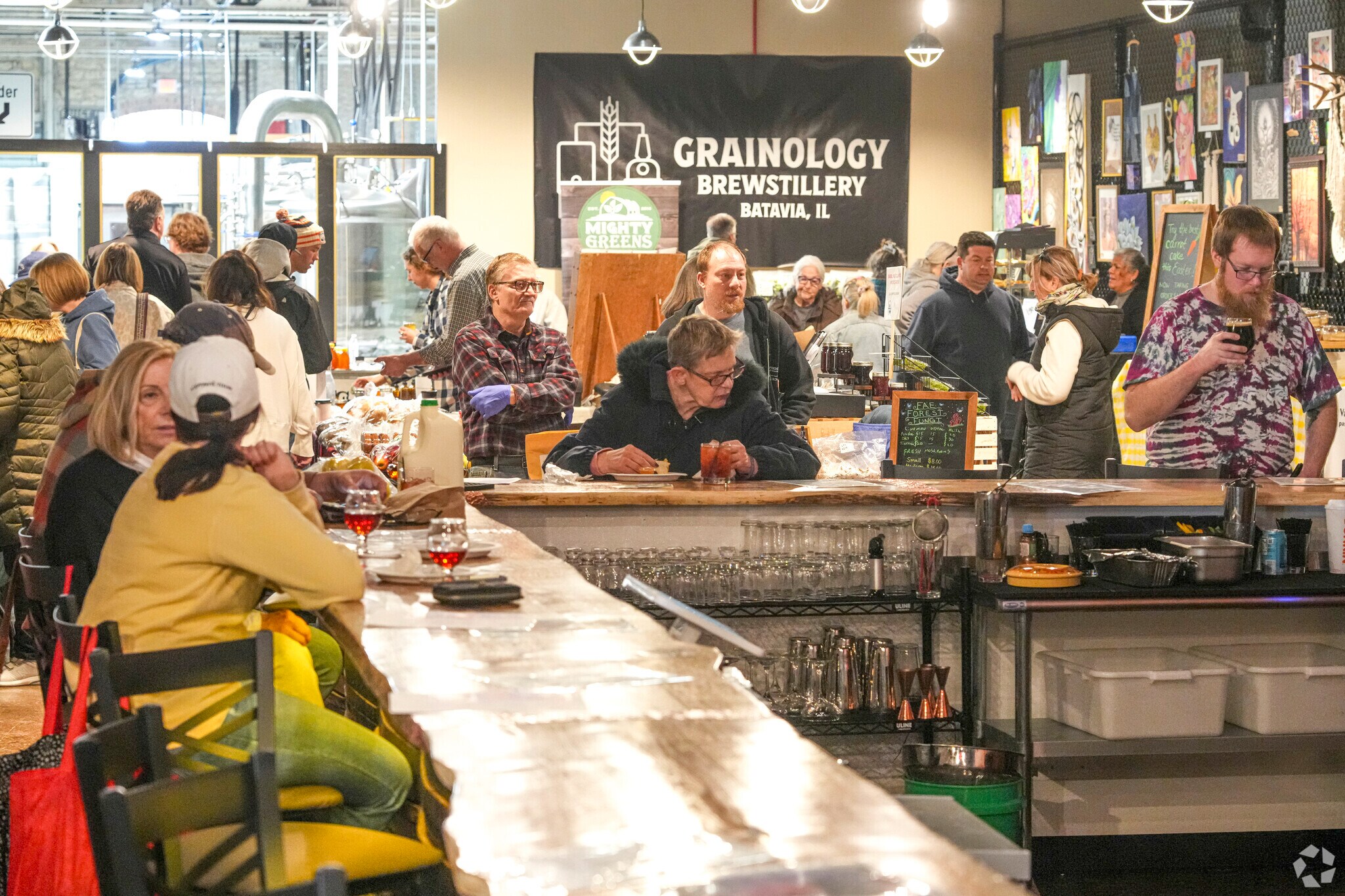 Sit and enjoy a drink with friends at the Batavia Indoor Market.
