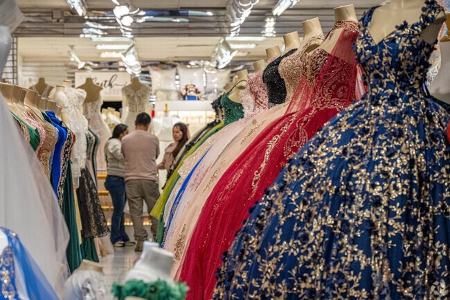 Locals enjoy browsing one of the many locally owned bridal shops on Pacific Boulevard in Huntington Park, California.