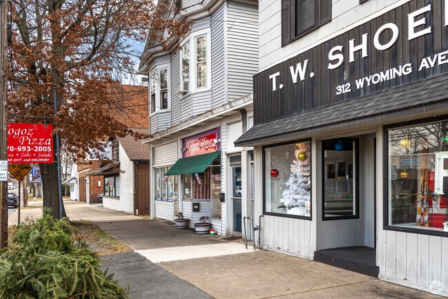 A typical view of storefronts on the central artery road of Wyoming Ave, Wyoming, PA.