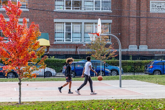 Locals frequent Pulaski Park to play basketball.