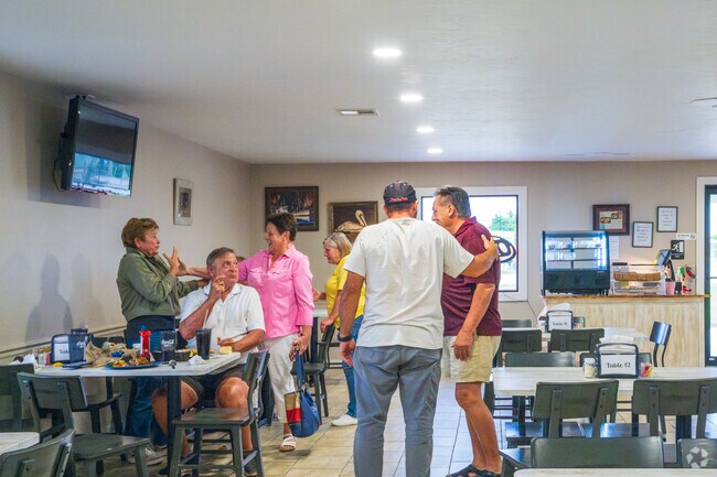 Family and friends light up the space yearround when dining in at Me-Maw's Cajun Cuisine in Galliano.