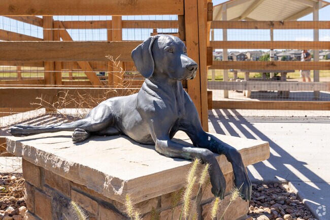 The Copperleaf dog park and off-leash area form a popular gathering spot.