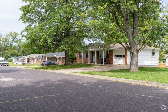 The single family homes in Meadowvale are often shaded by the older trees in the neighborhood.