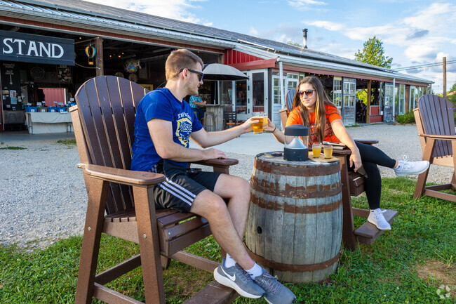 Enjoy a cold beer with a love one at Rising Silo Brewery near McBryde neighborhood.