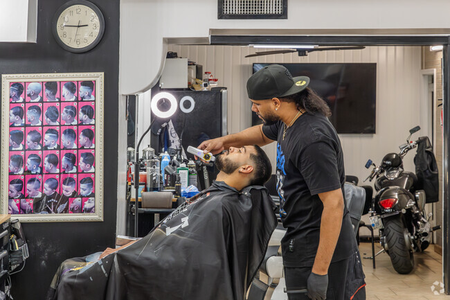 A variety of services can be found on Van Duzer in Grymes Hill, like Domnican Barbershop.