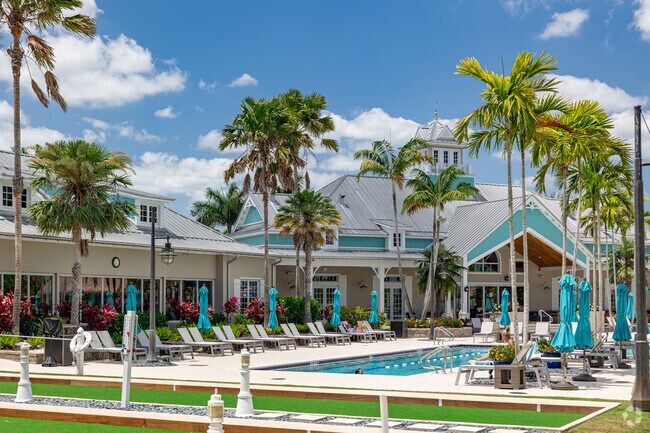 The Island Club at Naples Reserve features a large community swimming pool and recreation areas.
