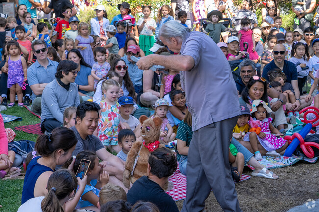 Puppet shows delight kids at the West Los Gatos Farmers Market.
