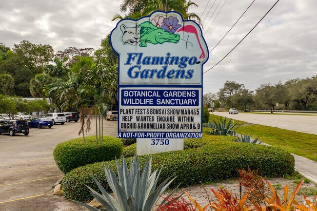 Signage at the entrance of Flamingo Gardens Botanical and Wildlife Sanctuary.